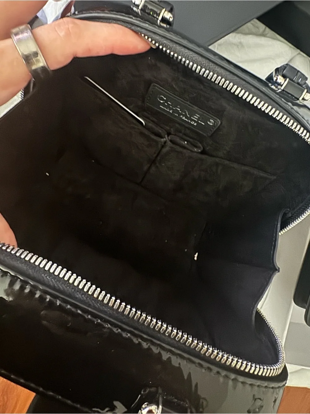 CHANEL Black Quilted Patent Top Handle Vanity Bag with red strap